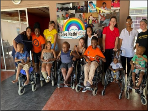 Children, staff and volunteers at Sive Nathi Home for children with disabilities.