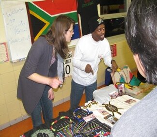 Grad. students Mbhekiseni Madela & Rebecca Vaughn attended Multicultural Celebration Night at Bottenfield Elementary (January 2012)
