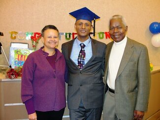 Professor Merle Bowen, Bezza Ayalew, and Professor Bokamba at graduation party for Dr. Ayalew.